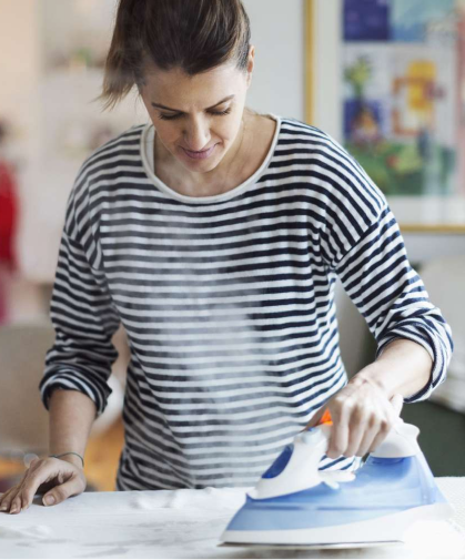Woman Ironing Clothes